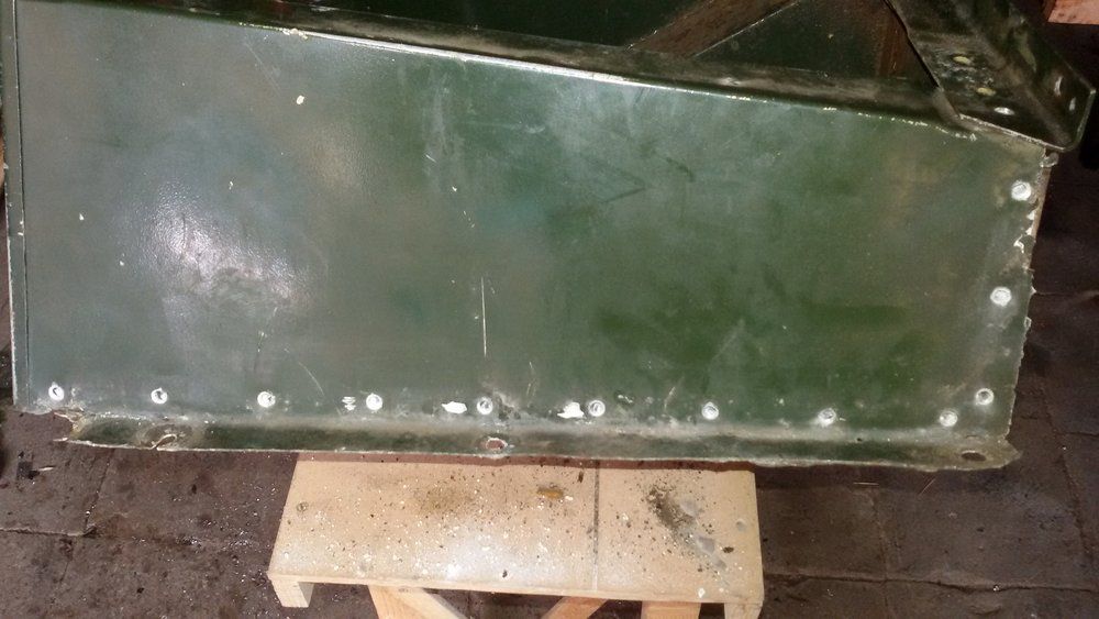1965 series 2a station wagon drilled out rivets on seat tub.jpg