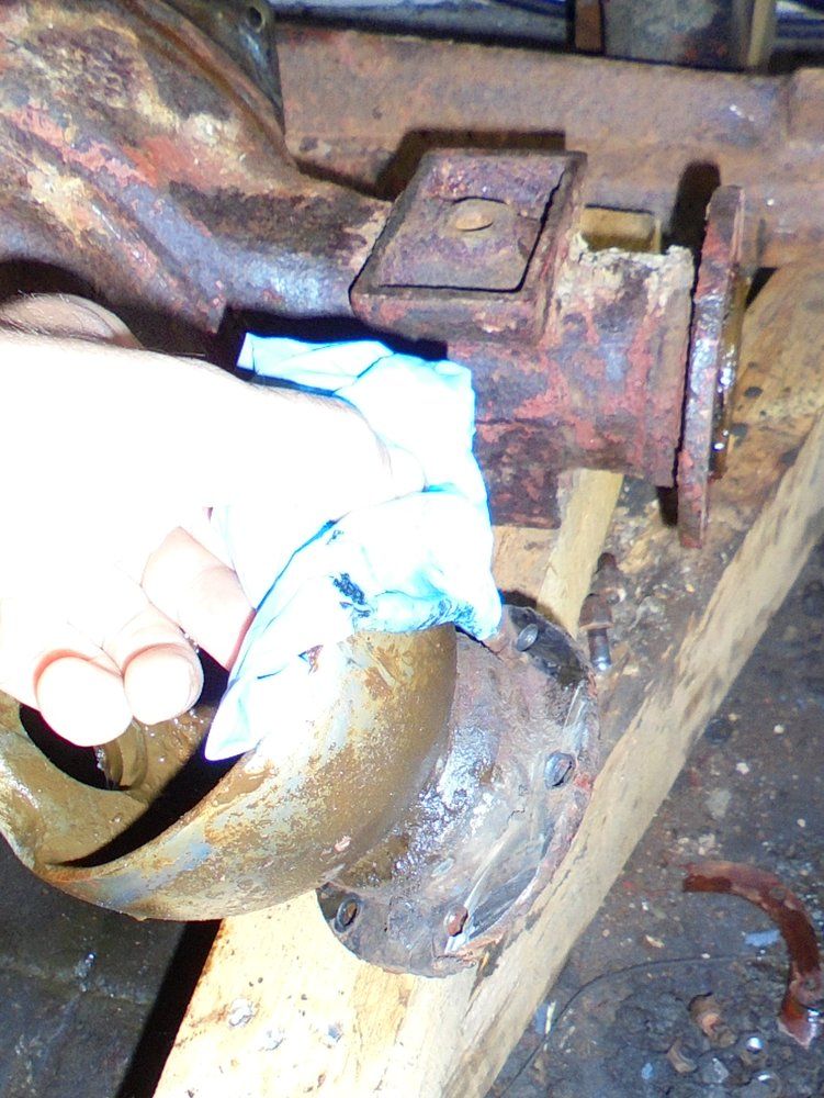 1965 series 2a station wagon front axle swivel bolts cut off1.JPG
