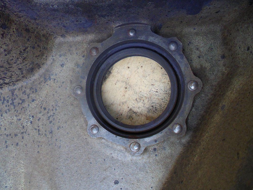 1965 series 2a station wagon front crankshaft mud shield1.JPG
