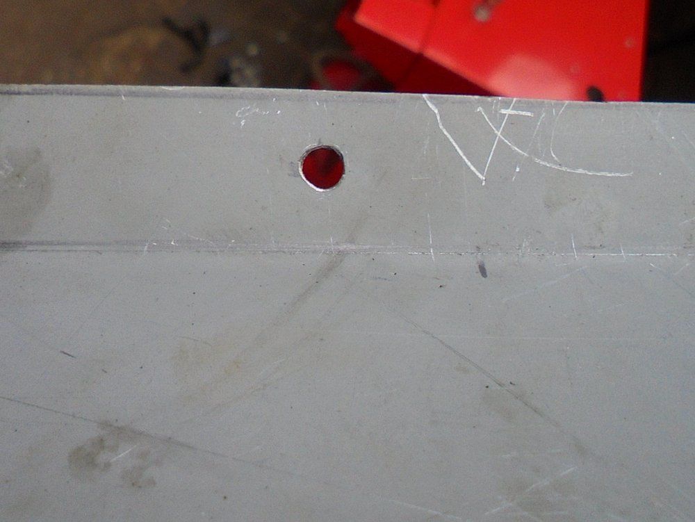 Sheet metal working drilled hole.JPG