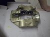 Range Rover calipers getting a coat of gold paint.jpg