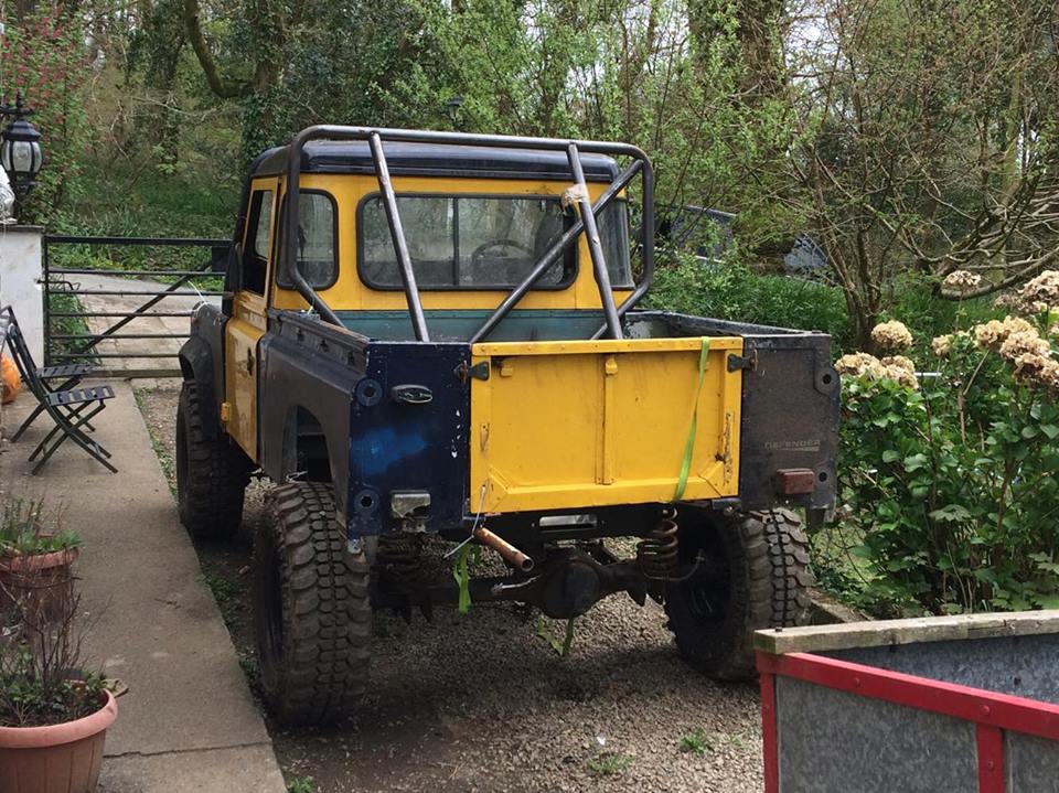 yellow 90 rear on drive.jpg