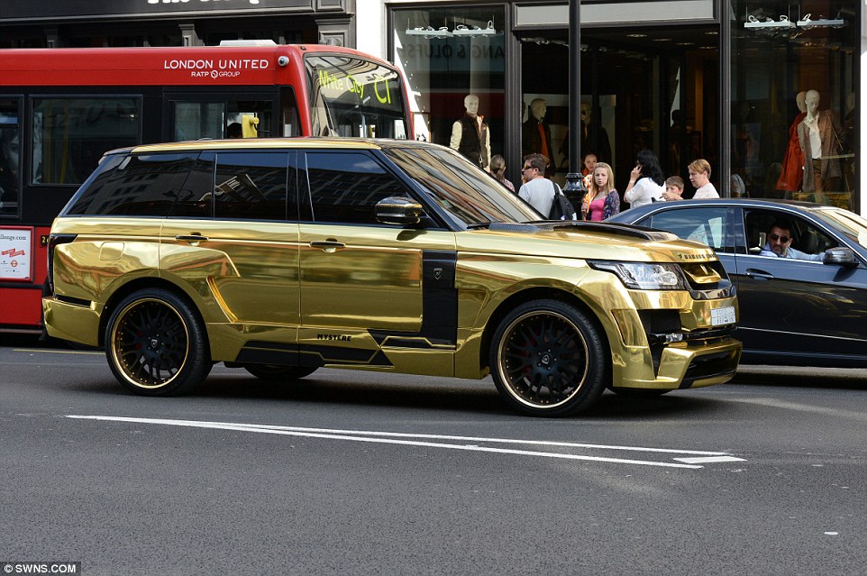 1407229980677_Image_galleryImage_Gold_Range_Rover_which_ha.JPG