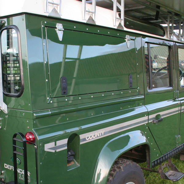 land-rover-defender-series-gull-wing-side-door-frame-window-mobile-storage-systems_6_grande.gif